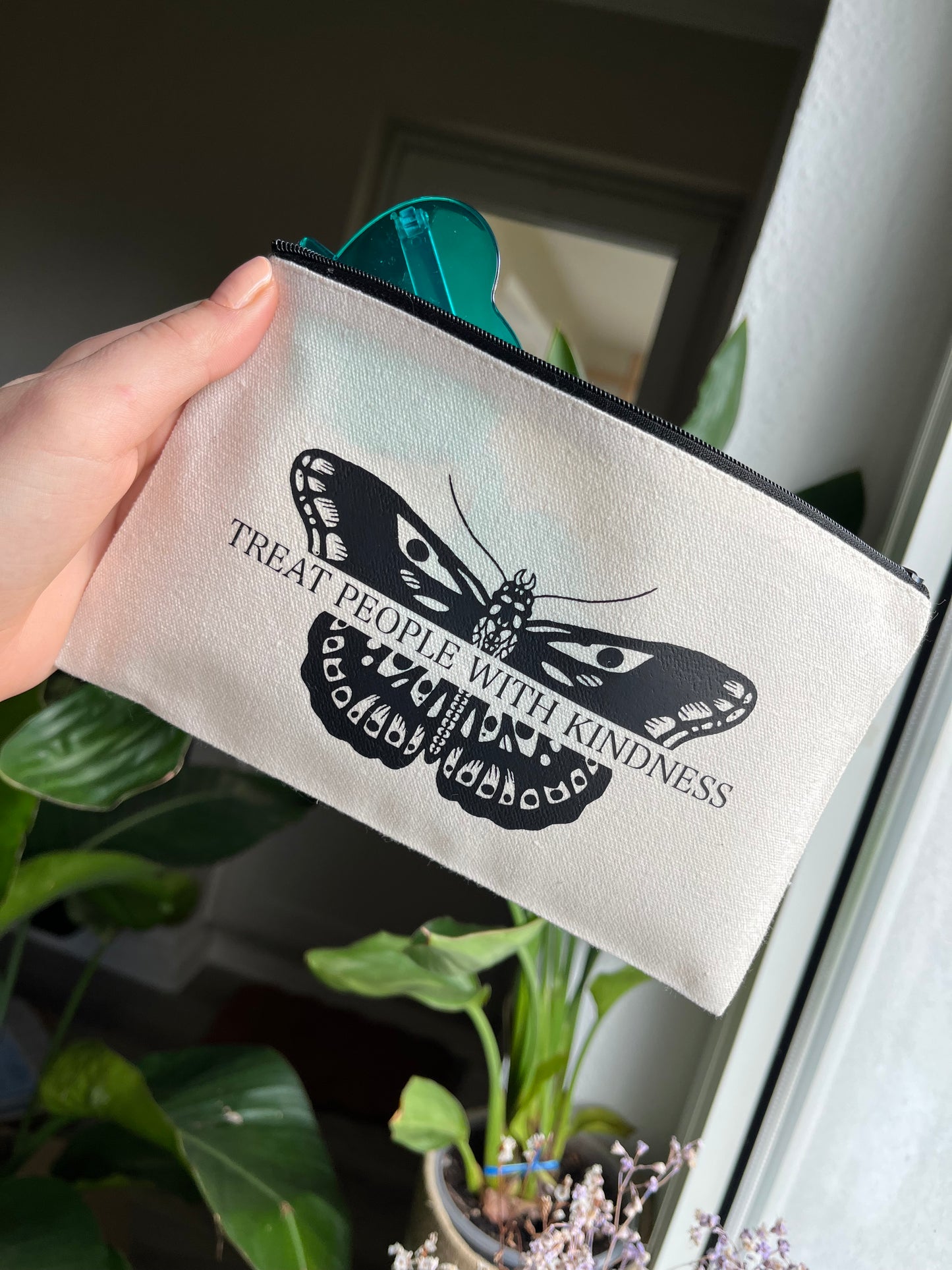 TPWK moth makeup bag