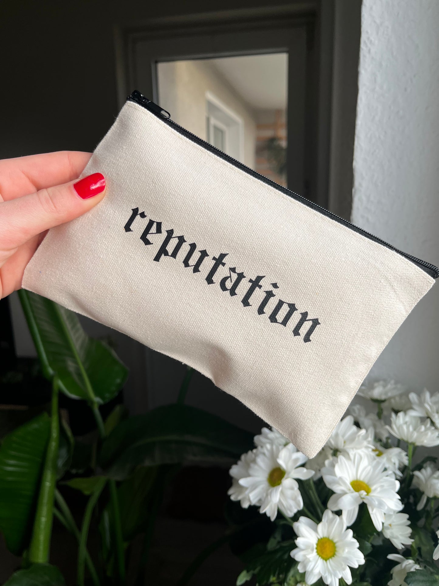 reputation makeup bag