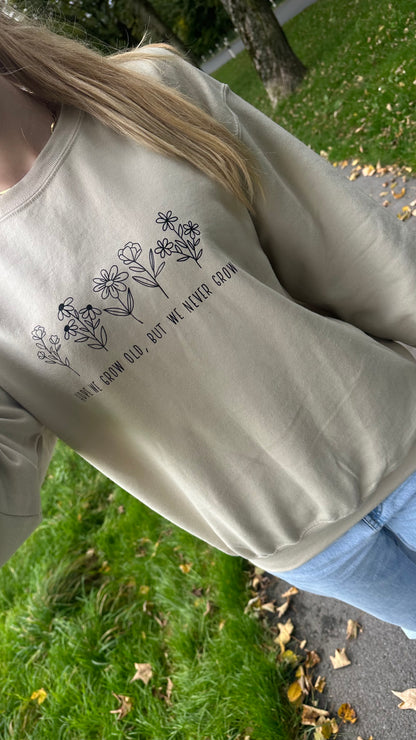 Never grow up crewneck