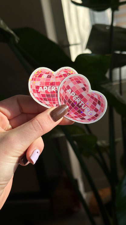 Aperture glitter sticker