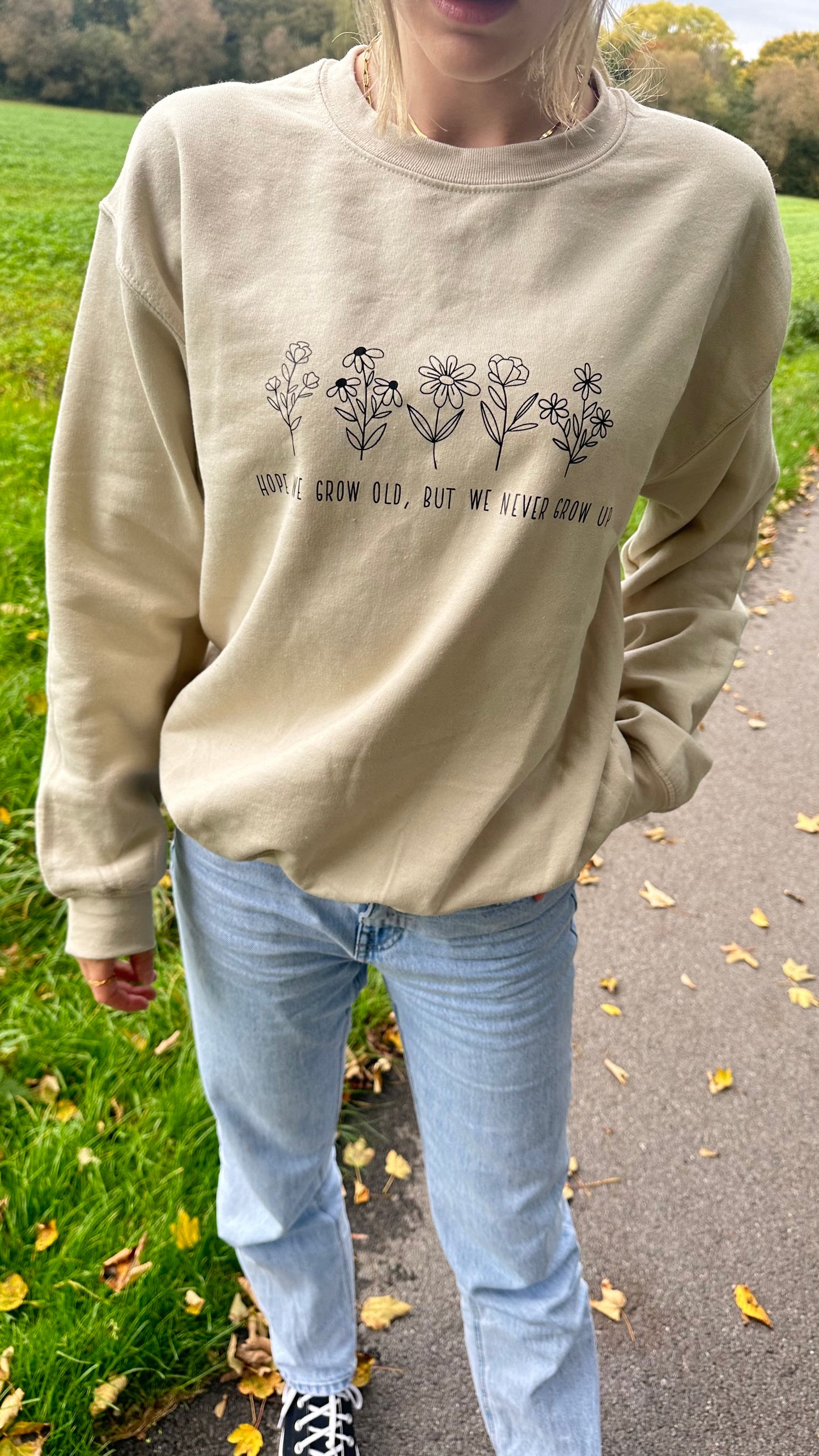 Never grow up crewneck