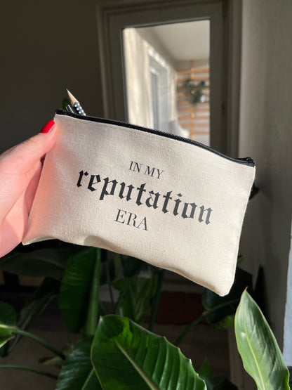 reputation makeup bag