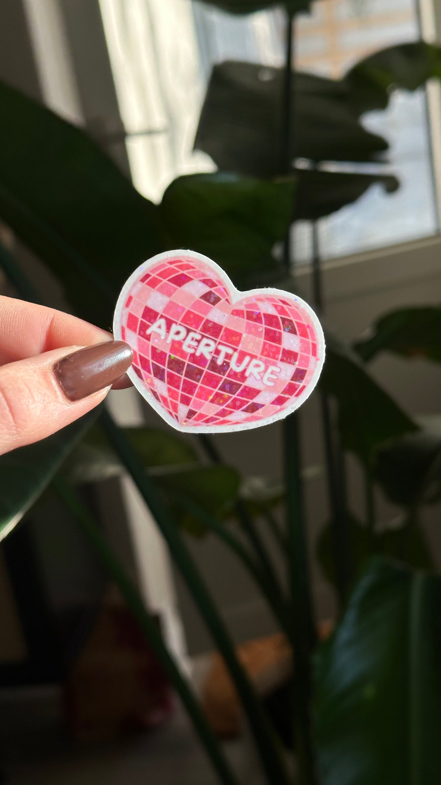 Aperture glitter sticker